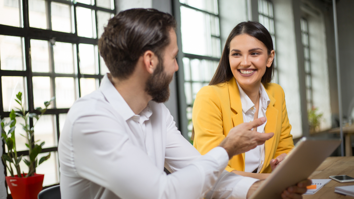 best cold email tools for outreach and lead generation featured image - man and woman working