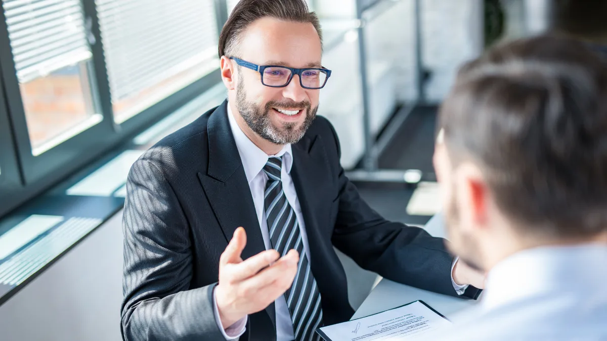 best website builders for small business featured image - business man