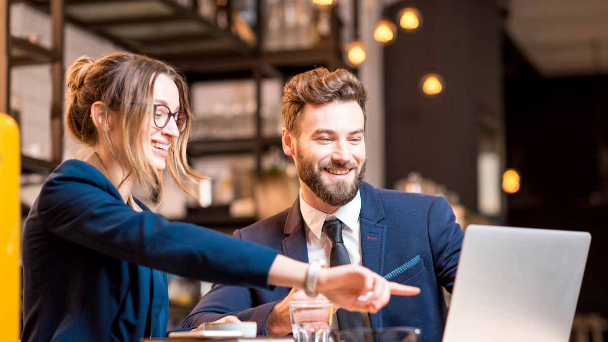 best website builders featured image business man and woman